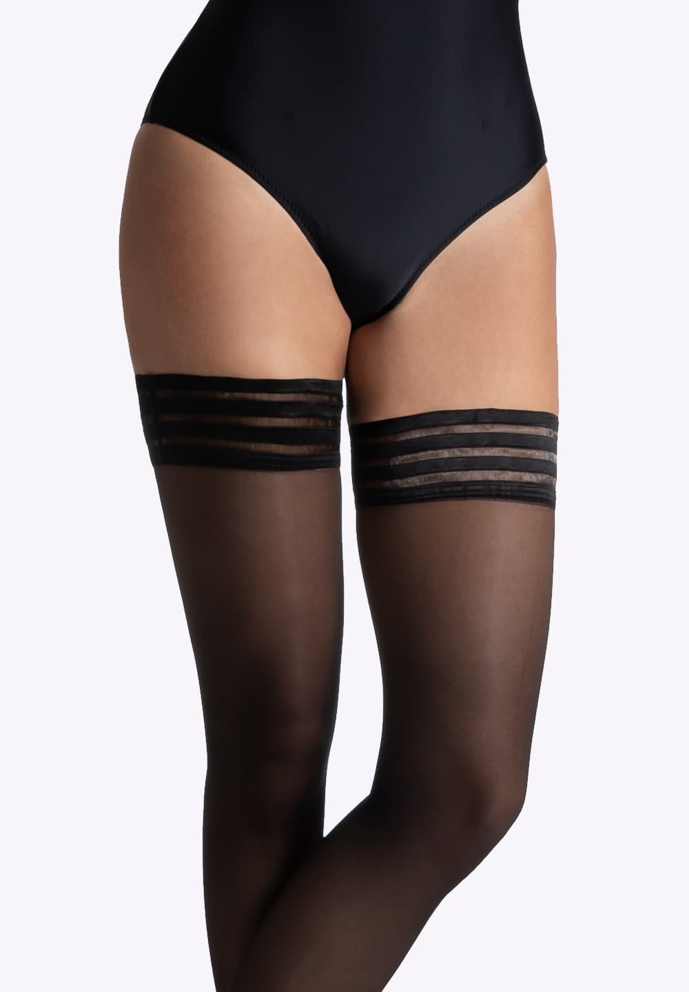 Elegante zwarte stay-ups van 15 denier die je benen verleidelijk omhullen met een zachte, zelfhoudende pasvorm.